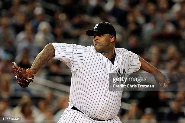Sabathia of the New York Yankees pitches against the Detroit Tigers during Game One of the American League Division Series at Yankee Stadium on...