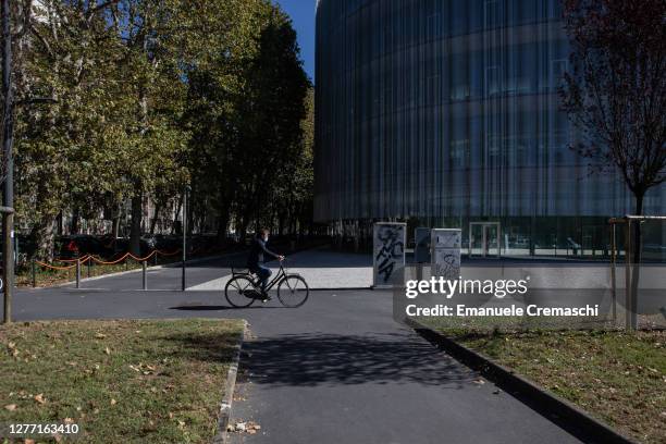 Cyclist rides past the new campus of Bocconi University on September 28, 2020 in Milan, Italy. Since the end of lockdown Milan authorities have added...