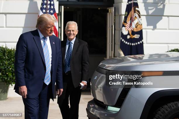 President Donald Trump and White House Trade Adviser Peter Navarro check out the new Endurance all-electric pickup truck on the south lawn of the...