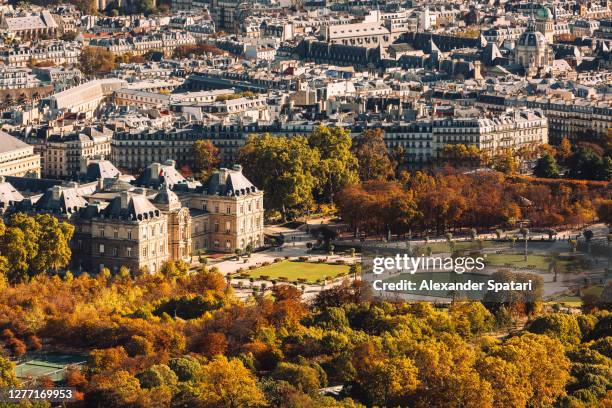 aerial view of paris with autumn colors, france - luxembourg stockfoto's en -beelden
