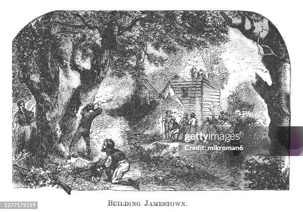 engraving illustration of the building of the settlement at jamestown, virginia, usa. - jamestown - fotografias e filmes do acervo