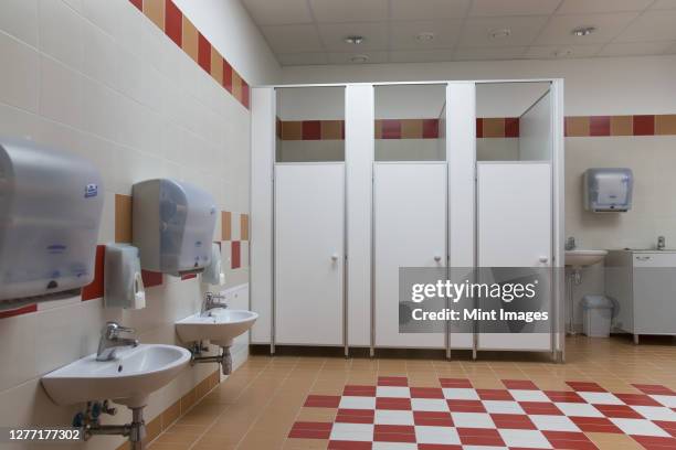 bathroom in primary school - bathroom door ストックフォトと画像