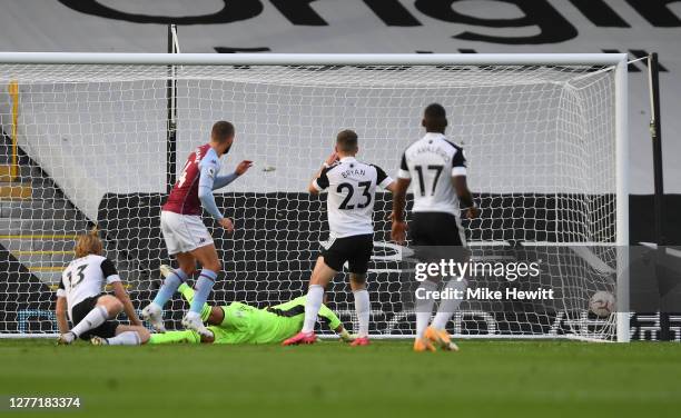 Conor Hourihane of Aston Villa scores his team's second goal during the Premier League match between Fulham and Aston Villa at Craven Cottage on...