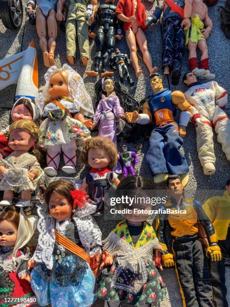 dolls and action figures for sale at second hand sale - actionfigure stock pictures, royalty-free photos & images