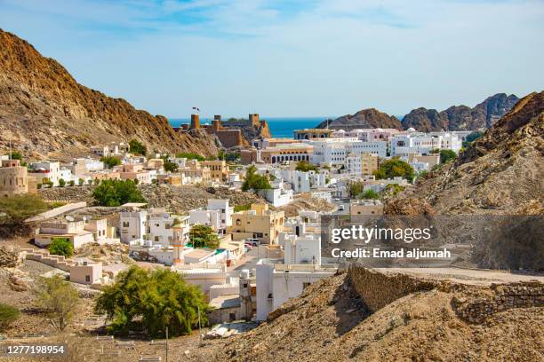 the quiet little town, the old muscat, on the coast in the gulf of oman - masqat oman stockfoto's en -beelden