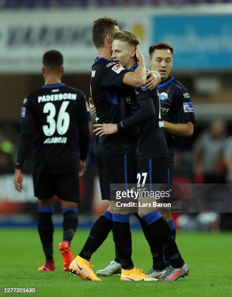 Chris Fuhrich of SC Paderborn 07 celebrates with teammates after scoring his sides second goal during the Second Bundesliga match between SC...