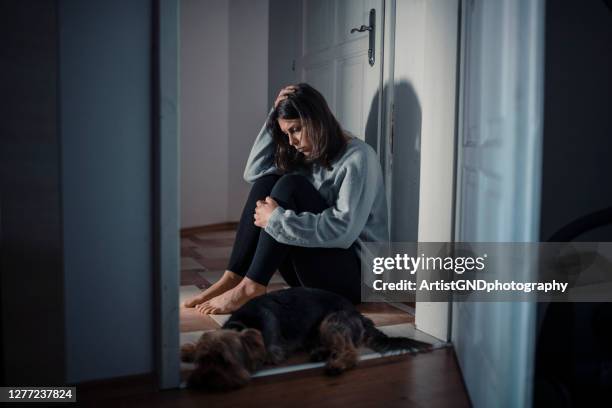 woman that is struggling from mental illnesses in a mental breakdown - suicide hotline stock pictures, royalty-free photos & images