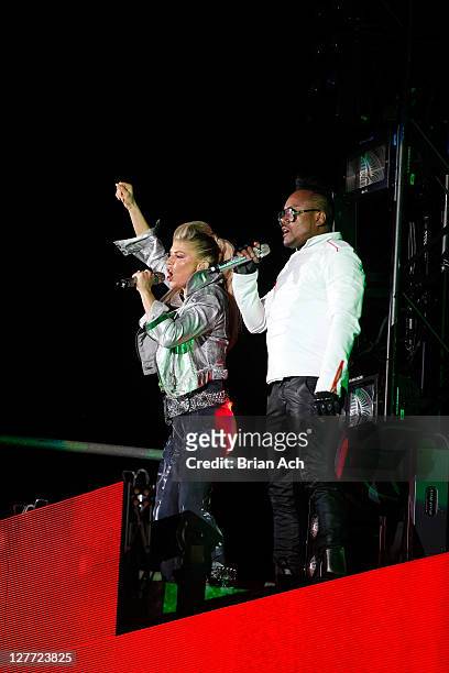 Fergie and apl.de.ap of the Black Eyed Peas perform onstage during CHASE Presents The Black Eyed Peas and Friends "Concert 4 NYC" benefiting the...
