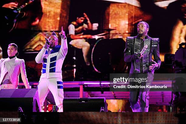 Taboo, apl.de.ap, and will.i.am perform onstage during CHASE Presents The Black Eyed Peas and Friends "Concert 4 NYC" benefiting the Robin Hood...