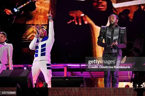 Taboo, apl.de.ap, and will.i.am perform onstage during CHASE Presents The Black Eyed Peas and Friends "Concert 4 NYC" benefiting the Robin Hood...