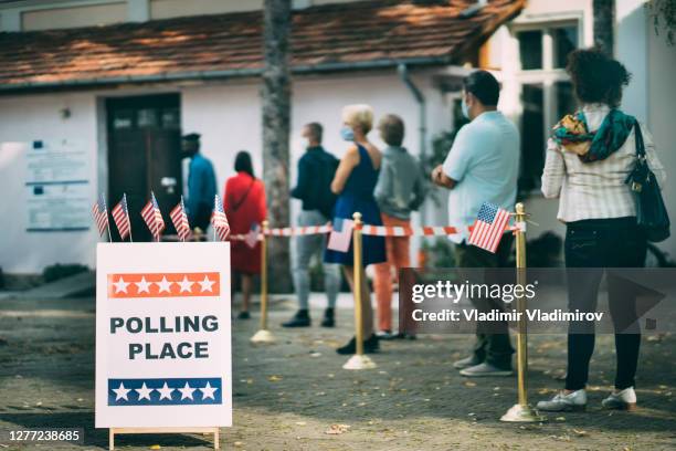 waiting in line on election day - political party lines stock pictures, royalty-free photos & images