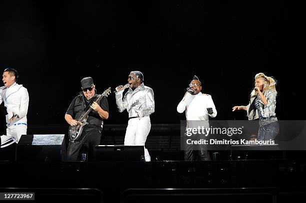 Taboo, George Pajon, Jr., will.i.am, apl.de.ap, and Fergie of The Black Eyed Peas perform onstage during CHASE Presents The Black Eyed Peas and...