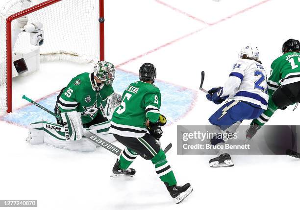 Brayden Point of the Tampa Bay Lightning scores a goal past Anton Khudobin of the Dallas Stars during the first period in Game Six of the 2020 NHL...