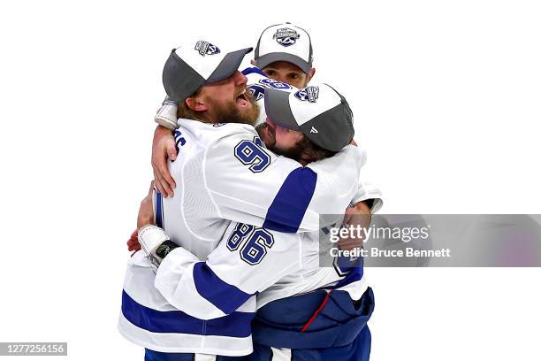 Mikhail Sergachev and Nikita Kucherov of the Tampa Bay Lightning celebrate following the series-winning victory over the Dallas Stars in Game Six of...