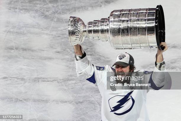 Nikita Kucherov of the Tampa Bay Lightning skates with the Stanley Cup following the series-winning victory over the Dallas Stars in Game Six of the...