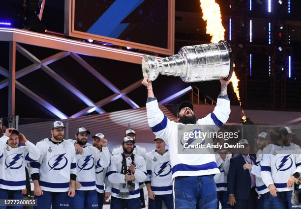 Zach Bogosian of the Tampa Bay Lightning hoists the Stanley Cup overhead after the Tampa Bay Lightning defeated the Dallas Stars 2-0 in Game Six of...