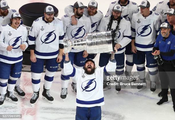Zach Bogosian of the Tampa Bay Lightning skates with the Stanley Cup following the series-winning victory over the Dallas Stars in Game Six of the...