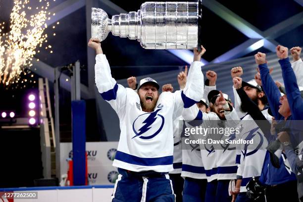 Steven Stamkos of the Tampa Bay Lightning hoists the Stanley Cup overhead after the Tampa Bay Lightning defeated the Dallas Stars 2-0 in Game Six of...