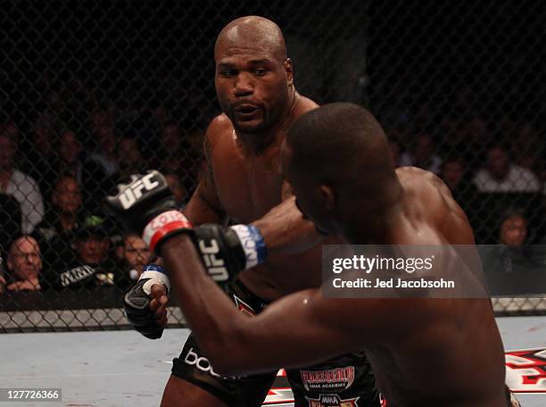 Quinton "Rampage" Jackson punches Jon Jones during the UFC 135 event at the Pepsi Center on September 24, 2011 in Denver, Colorado.