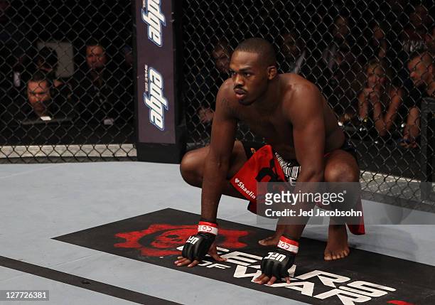 Jon Jones stands in the Octagon before his bout with Quinton "Rampage" Jackson during the UFC 135 event at the Pepsi Center on September 24, 2011 in...