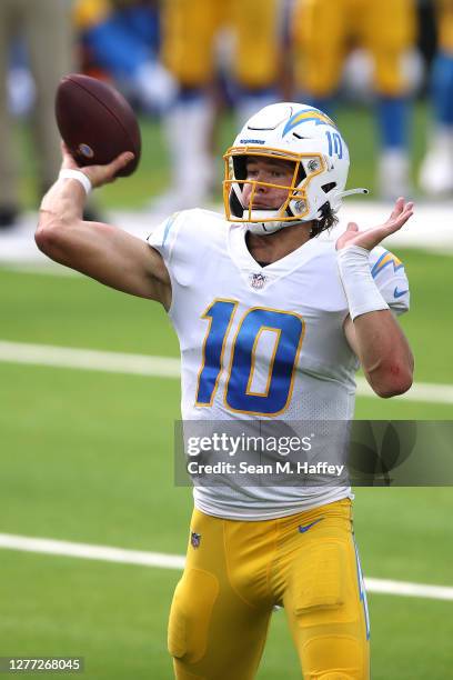 Justin Herbert of the Los Angeles Chargers passes the ball during the second half of a game against the Carolina Panthers at SoFi Stadium on...