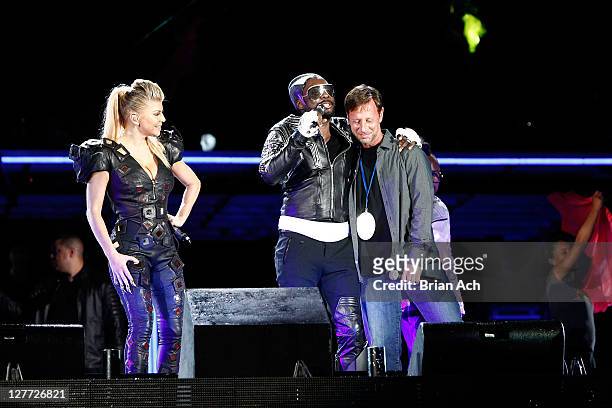 Fergie, will.i.am, and Peter Muller of Robin Hood perform onstage during CHASE Presents The Black Eyed Peas and Friends "Concert 4 NYC" benefiting...