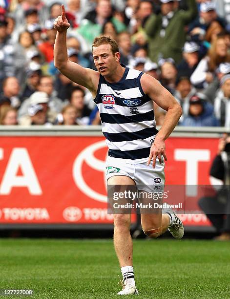 Steve Johnson of the Cats celebrates a goal during the 2011 AFL Grand Final match between the Collingwood Magpies and the Geelong Cats at Melbourne...