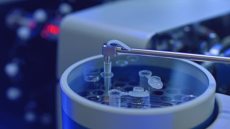 Apparatus for automatic sampling, analysis. A robo hand takes a sample ...