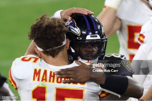 Quarterbacks Patrick Mahomes of the Kansas City Chiefs and Lamar Jackson of the Baltimore Ravens hug following the Chiefs win at M&T Bank Stadium on...