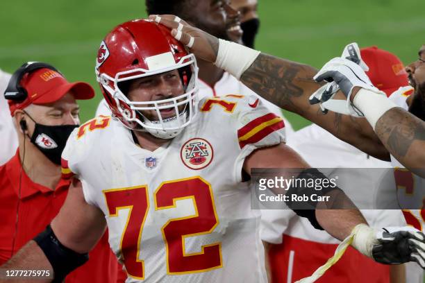 Offensive tackle Eric Fisher of the Kansas City Chiefs celebrates after catching a touchdown pass against the Baltimore Ravens at M&T Bank Stadium on...