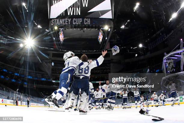 Goaltender Andrei Vasilevskiy of the Tampa Bay Lightning celebrates with Anthony Cirelli and team after the Lightning defeated the Dallas Stars 2-0...