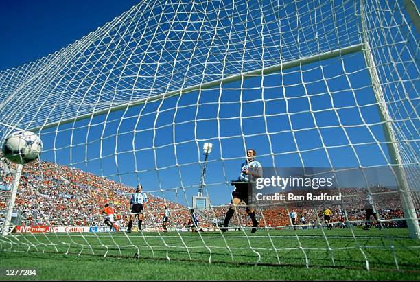 Patrick Kluivert of Holland scores during the World Cup quarter-final against Argentina at the Stade Velodrome in Marseilles. Holland won the match...