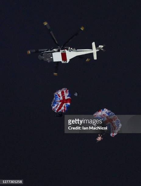 Performers play the parts of James Bond and Queen Elizabeth II during the Opening Ceremony of the London 2012 Olympic Games, directed by Danny Boyle,...