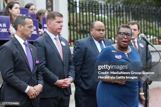 Accompanied by other Massachusetts mayors, including Somerville Mayor Joseph Curtatone, left, Boston Mayor Martin Walsh, and Lawrence Mayor Dan...