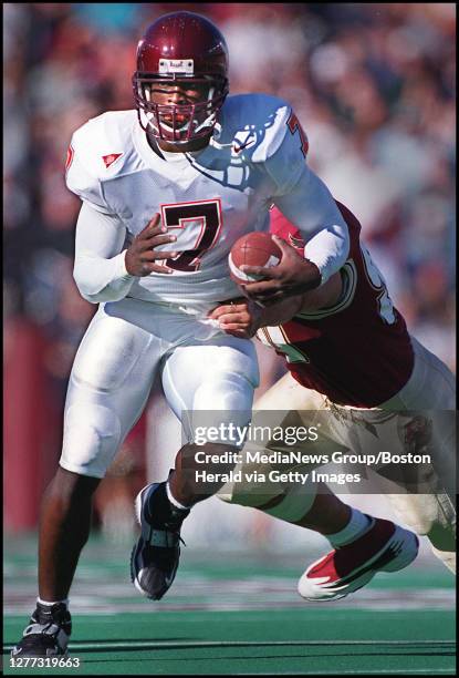 9/30/00. VIRGINIA TECH VS BC. MICHAEL VICK BREAKS A TACKLE ON A 1ST Q. RUN. STAFF PHOTO BY MICHAEL SEAMANS SAVED IN PHOTO 6