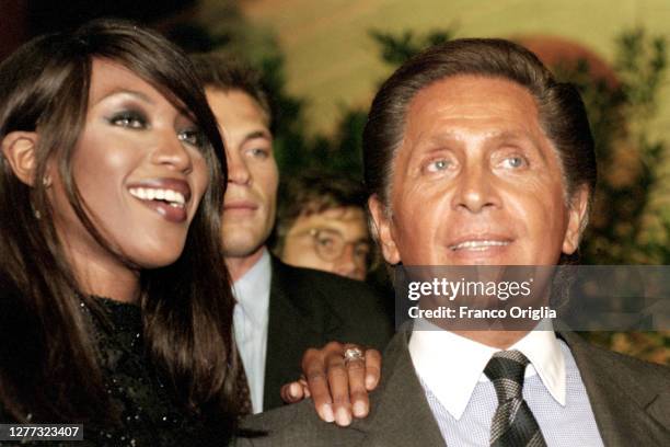 Italian fashion designer Valentino, whose real name is Valentino Garavani, ant top model Naomi Campbell arrive at the party for the inauguration of...