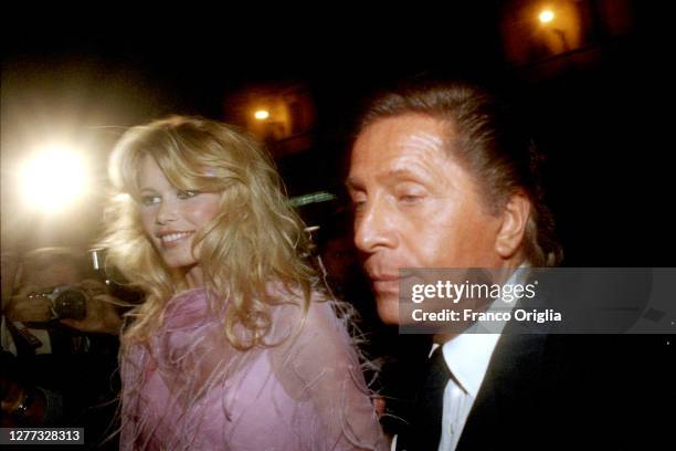 Italian fashion designer Valentino, whose real name is Valentino Garavani, and top model Claudia Schiffer attend a party for the inauguration of...