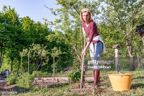 Woman Racking Lawn 1,376 Woman Raking Lawn Stock Photos, High-Res Pictures, and Images ...