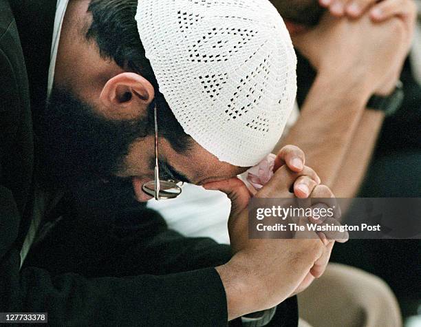 Sheikh Anwar Al-Awlaki , the Imam of the Dar Al Hijrah muslim mosque in Falls Church, prays during a community press conference/ prayer service at...