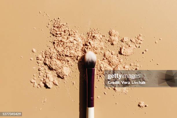 set of makeup brushes on a beige background. copy space. top view. - paintbrush palette stock pictures, royalty-free photos & images