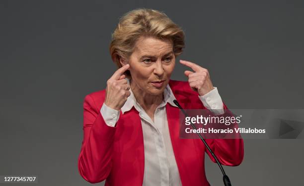 The President of the European Commission Ursula von der Leyen gestures while delivering remarks in the presentation of the European and Portuguese...