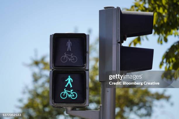 bicycle and pedestrian traffic signal - bike pedestrian stock pictures, royalty-free photos & images