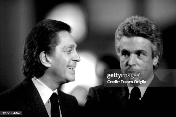 Italian fashion designer Valentino, whose real name is Valentino Garavani, and Giancarlo Giammetti attend Federico Fellini funeral at the church of...