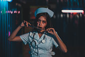 Horror scary evil insane nurse doctor held the knife, Zombie woman gosth with halloween concept