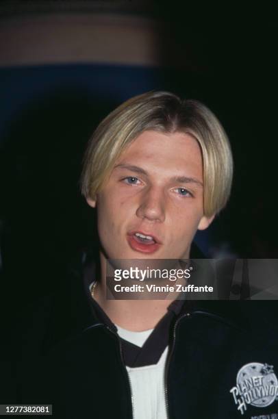 American singer Nick Carter of the Backstreet Boys at the Planet Hollywood Beverly Hills to donate an outfit from their recent world tour to Planet...
