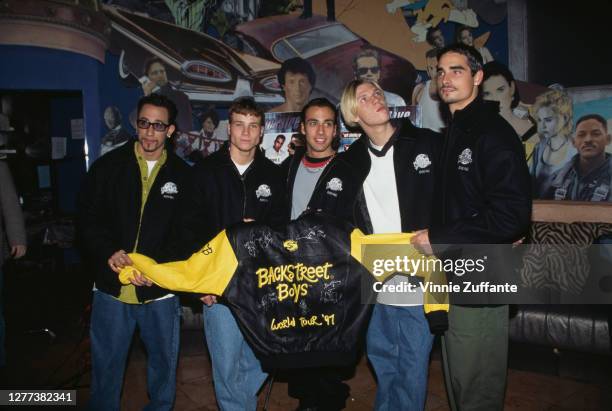 The Backstreet Boys at the Planet Hollywood Beverly Hills to donate an outfit from their recent world tour to Planet Hollywood's world renown...