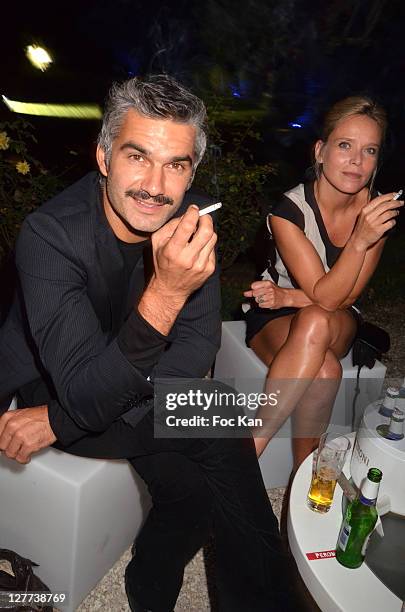 Francois Vincentelli and Marie Guillard attend the Peroni - Nastro Azzuro Beer Cocktail Party at the Italian Embassy on September 29, 2011 Paris,...