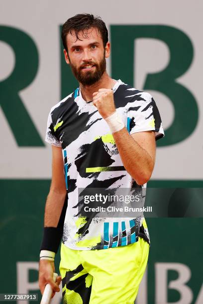 Quentin Halys of France celebrates after winning a point during his Men's Singles first round match against Marcos Giron of the United States on day...