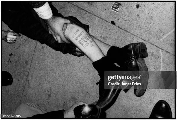 View of a tattoo on the leg of an unidentified homicide victim in the Haight Ashbury neighborhood, San Francisco, California, December 1973. The...