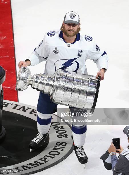 Steven Stamkos of the Tampa Bay Lightning skates with the Stanley Cup following the series-winning victory over the Dallas Stars in Game Six of the...